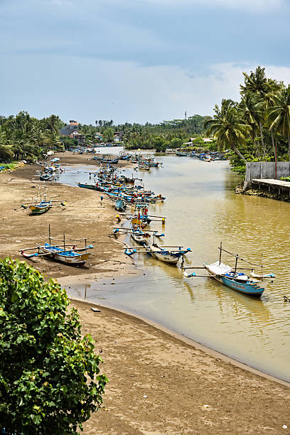istock Coastal scene and local boats on the island of Java 2238679945