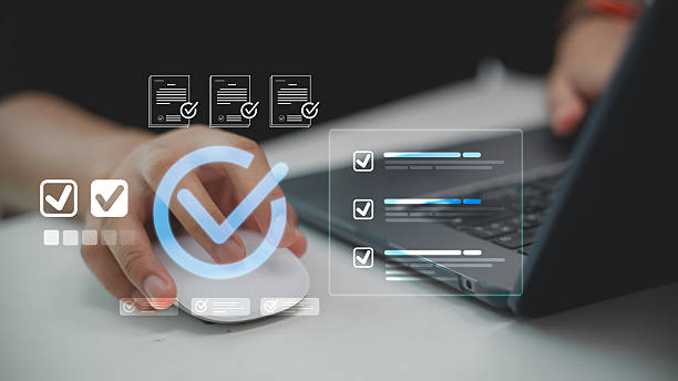 istock Close-up of hand using mouse with digital checklist and checkmark icons, symbolizing task completion, productivity, project management, workflow approval, and online document verification. 2238680007