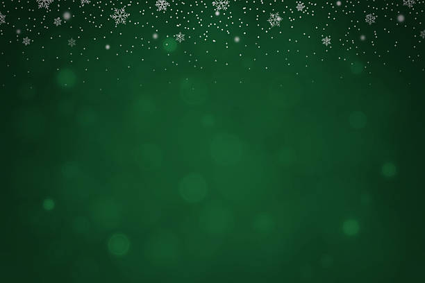 istock Green christmas background with falling snowflakes 2238680588