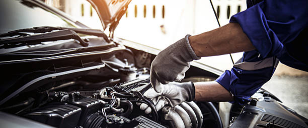 istock Car care maintenance and servicing, Close-up hand technician auto mechanic using the wrench to repairing change spare part car engine problem and car insurance service support. 2238682839