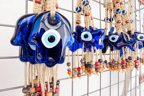 istock Row of blue and black beads hang from a wire 2238683790