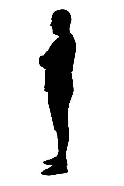 istock silhouette of side view of a man standing 2238686326