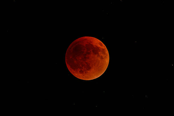 istock Lunar Eclipse with Blood Moon Effect in a Clear Night Sk 2238686716