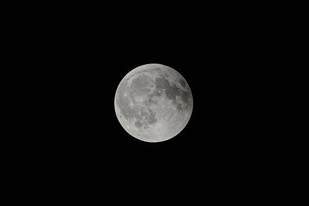 istock Full Moon Following Partial Lunar Eclipse in a Clear Night Sky 2238686722