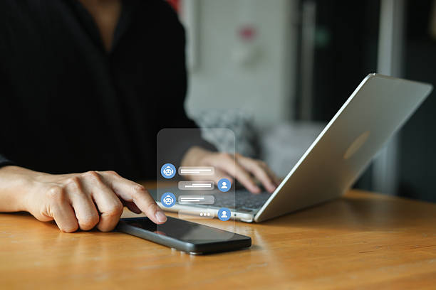 istock close up young man hold smartphone and use service on website to talk and ask question and consult about business with Ai model assistant chat for chatbot future technology and lifestyle concept 2238686742