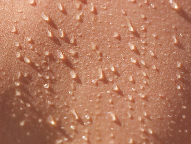istock A person's back is wet with water 2238691358