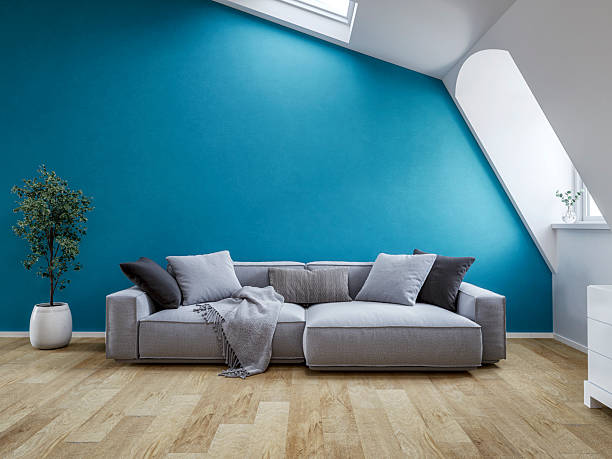 istock Front view of a Bright Scandinavian Loft Interior with Roof windows (skylight), sloped ceiling, Cozy Sofa and Decorative Cushions 2238693992