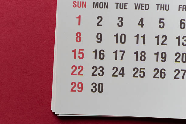 A desktop calendar with the date February 14th on a bright red background. The concept of Valentine's Day greetings.