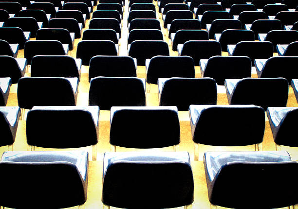 Germany.Empty rows of stadium seats  deserted sports venue with geometric pattern. July 3,2009