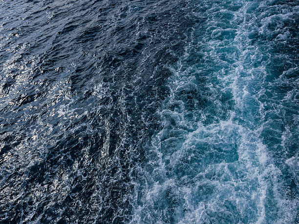 istock Beautiful sea waves behind a boat 2238702690