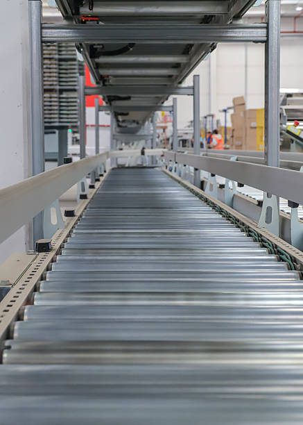 istock packing line in a logistics warehouse. conveyor belt in a modern production line 2238704230