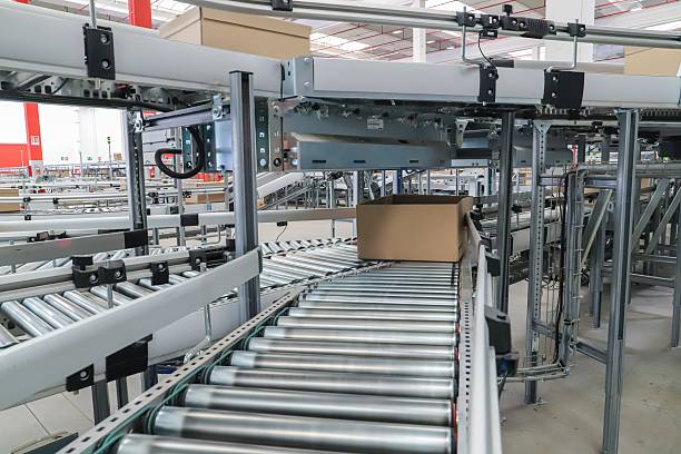 istock packing line in a logistics warehouse. conveyor belt in a modern production line 2238704239