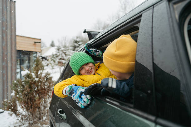 istock Smiling boys on a winter road trip 2238706463