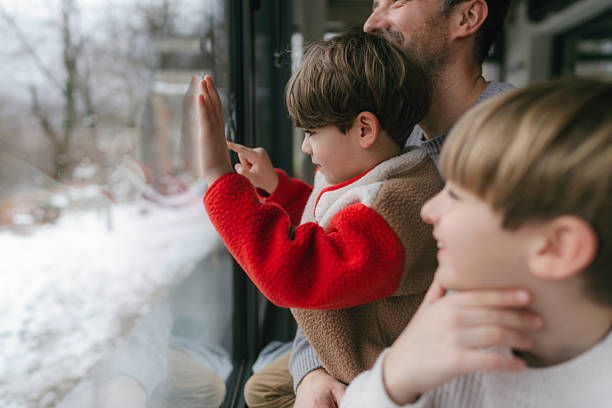 istock Cosy moments with my boys while it's snowing outside 2238706526
