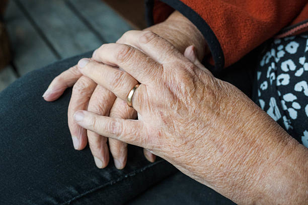 istock Hands of a woman, senior. 2238708187