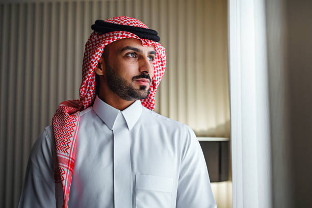 istock Confident Young Arabic Businessman Looking Out the Window 2238709791