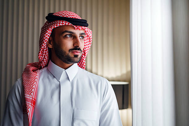 istock Confident Young Arabic Businessman Standing by Window 2238709799