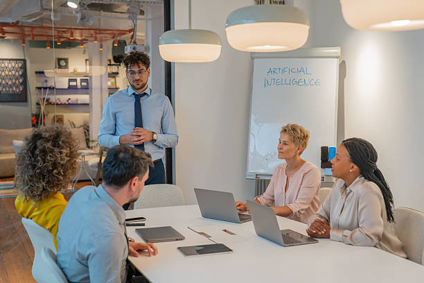 istock Business team discussing artificial intelligence in modern office 2238715385