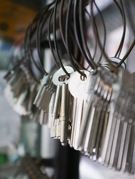 istock Multiple Duplicate Keys Hanging on Wire Rings at Locksmith Shop - Key Cutting and Duplication Service Business 2238716912