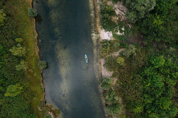 istock High angle view of canoe floating 2238722086