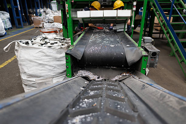 istock Heavy-duty recycling conveyor with metal debris 2238726406
