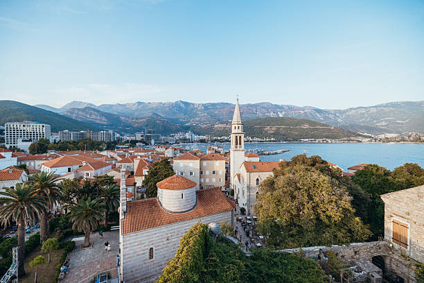 istock Coastal Town with Church Tower and Mountains 2238730890