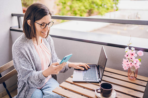 istock Cheerful woman working from home 2238740462