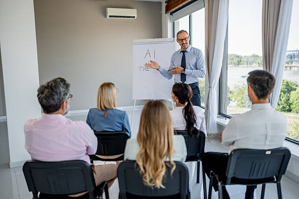 istock Lecturer presenting ai business concept to attentive multi-ethnic audience 2238742127
