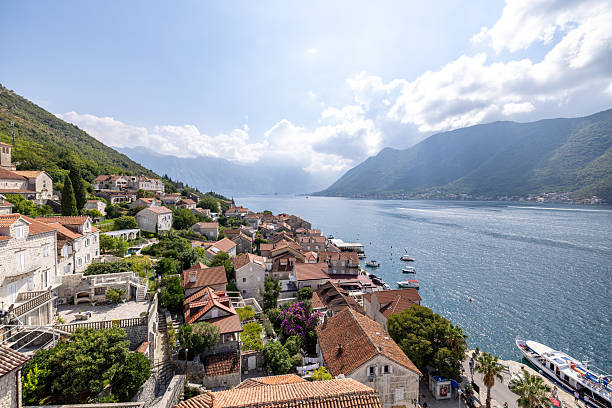 istock Coastal Town with Red Roofs and Mountain View 2238742508