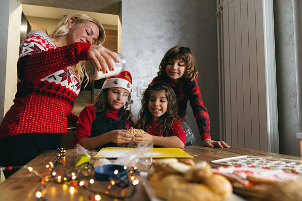 istock Family making gingerbread cookies together 2238742776