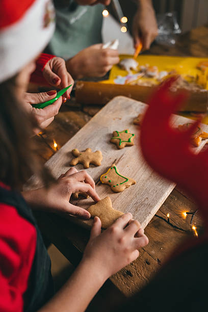 istock Family enjoying Christmas cookie baking 2238743431