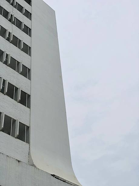 istock High-rise building with a distinctive curved white facade. 2238745037