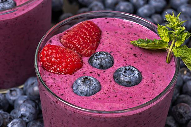 istock Color contrast: bluish cranberries and ruby-red juice, an image full of life and nuances 2238746114