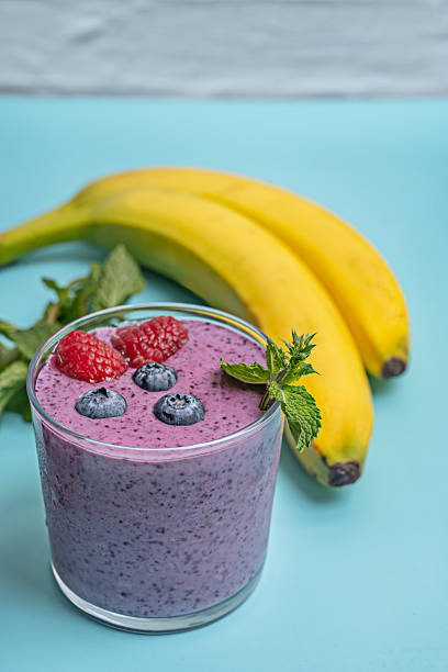 istock Unsweetened blueberry and coconut milk smoothie, with Macadamia nut toppings and cinnamon powder 2238746236