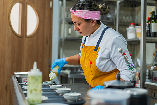 istock Restaurant owner gets ready to open the doors and start serving customers 2238746691