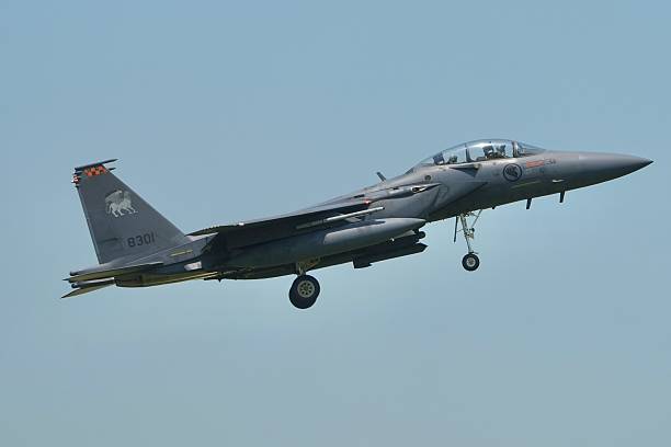 Fighter Planes on exercise flying in formation near airbase in Singapore
