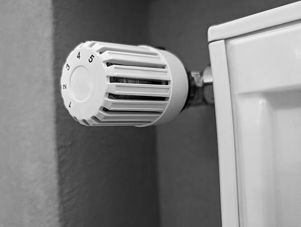 istock White radiator with thermostat temperature control 2238756000