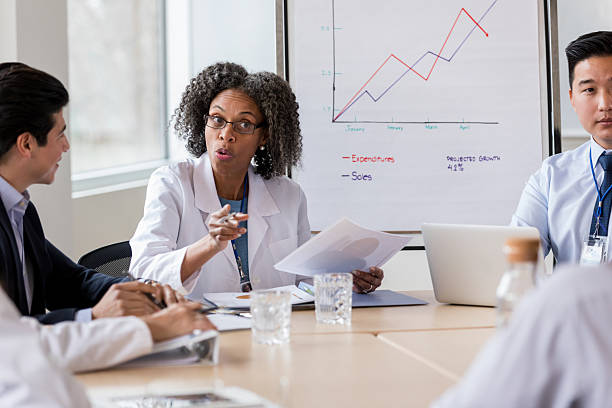 istock Diverse medical professionals discuss projected growth charts in a collaborative meeting. 2238761468