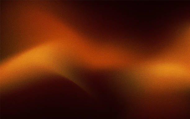 istock background grainy concept black, orange and brown gradient colorful 2238765396
