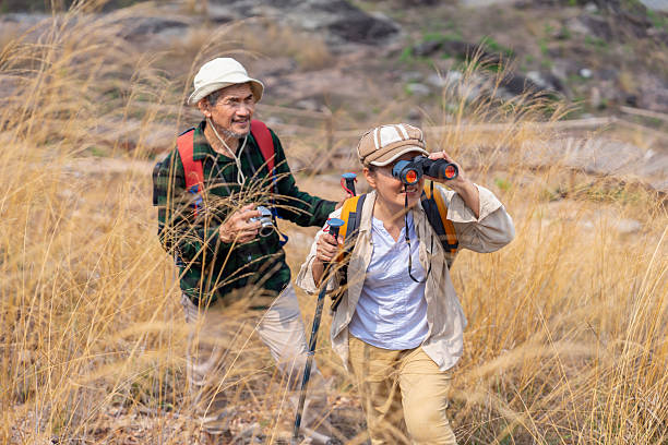 istock bonding active senior couple with backpack and trekking poles exploring in the forest together 2238770190