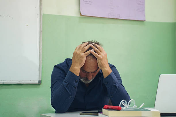 istock Frustrated teacher reacting to students' lack of knowledge in classroom 2238773358