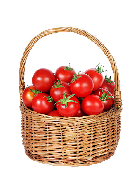 istock ripe red tomatoes in wicker basket isolated on white 2238774052