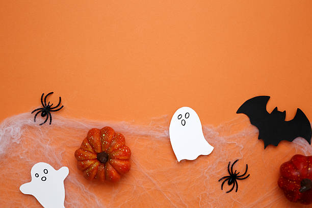 istock Halloween decoration pumpkins bats ghosts spooky festive atmosphere 2238774228
