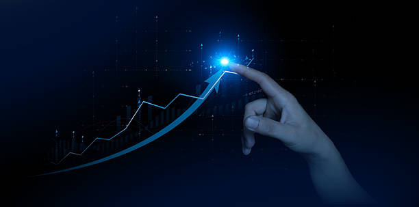 istock Hand touching glowing rising financial graph arrow with digital data on dark futuristic background 2238779709
