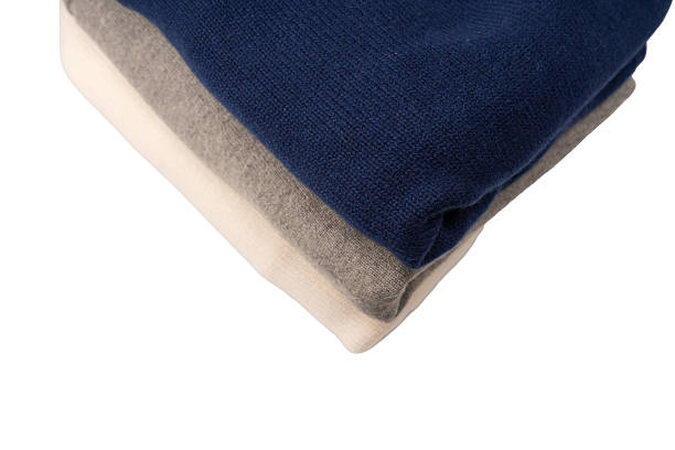 istock A group of warm sweaters isolated on a white background. 2238788495