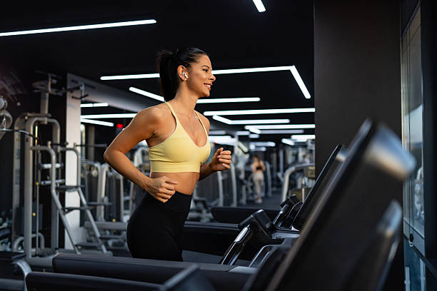 istock Working out on treadmill in the gym. 2238794039