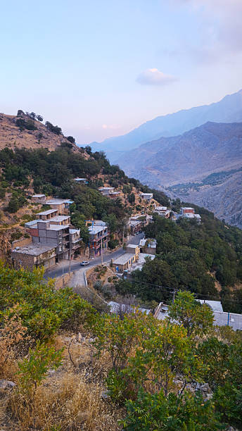 istock Mountain village road and homes 2238796828