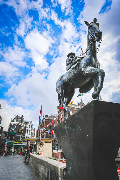 Netherlands, Amsterdam. September 29, 2025. Statue of Queen Wilhelmina designed by Dutch sculptor Theresia van der Pant on Rokin street .Erected in 1972.