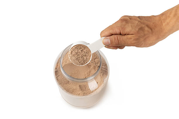 istock Protein powder.protein shake isolated on white background.Shaker bottle with protein.Food supplement.Whey protein powder with shaker for mixing.Sports nutrition.Concept of sports and healthy lifestyle 2238798921