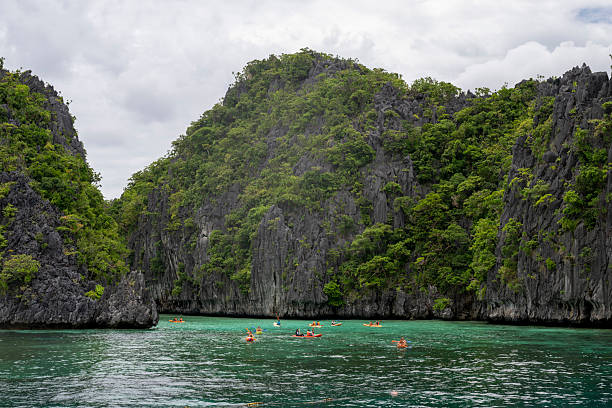 istock Aerial view of kayaks exploring tropical lagoon 2238802060